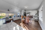 Open plan living area & casual eating area at bar